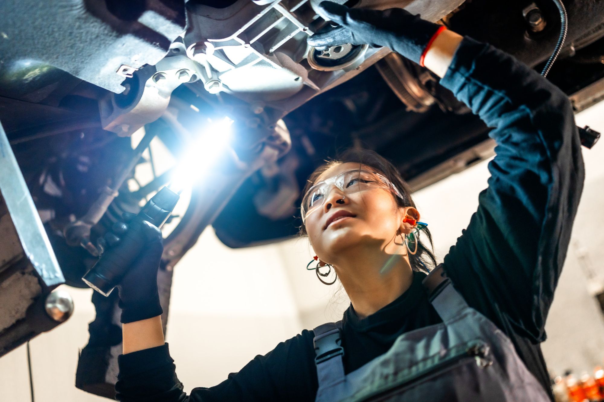 Mechanic working on car